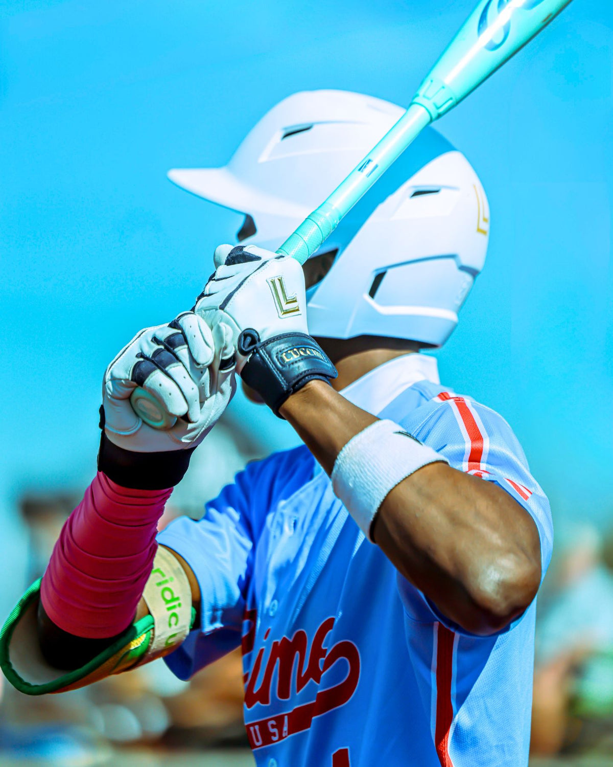 Luccini Navy Blue Gloves on USA Prime Baseball Player batting in game