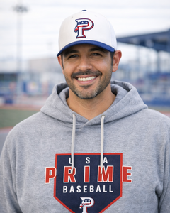 Man wearing a gray 'USA Prime Baseball' hoodie and white cap with red logo.