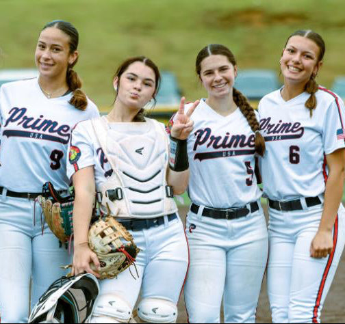 usa prime national softball team photo of 6 girls posing on the field
